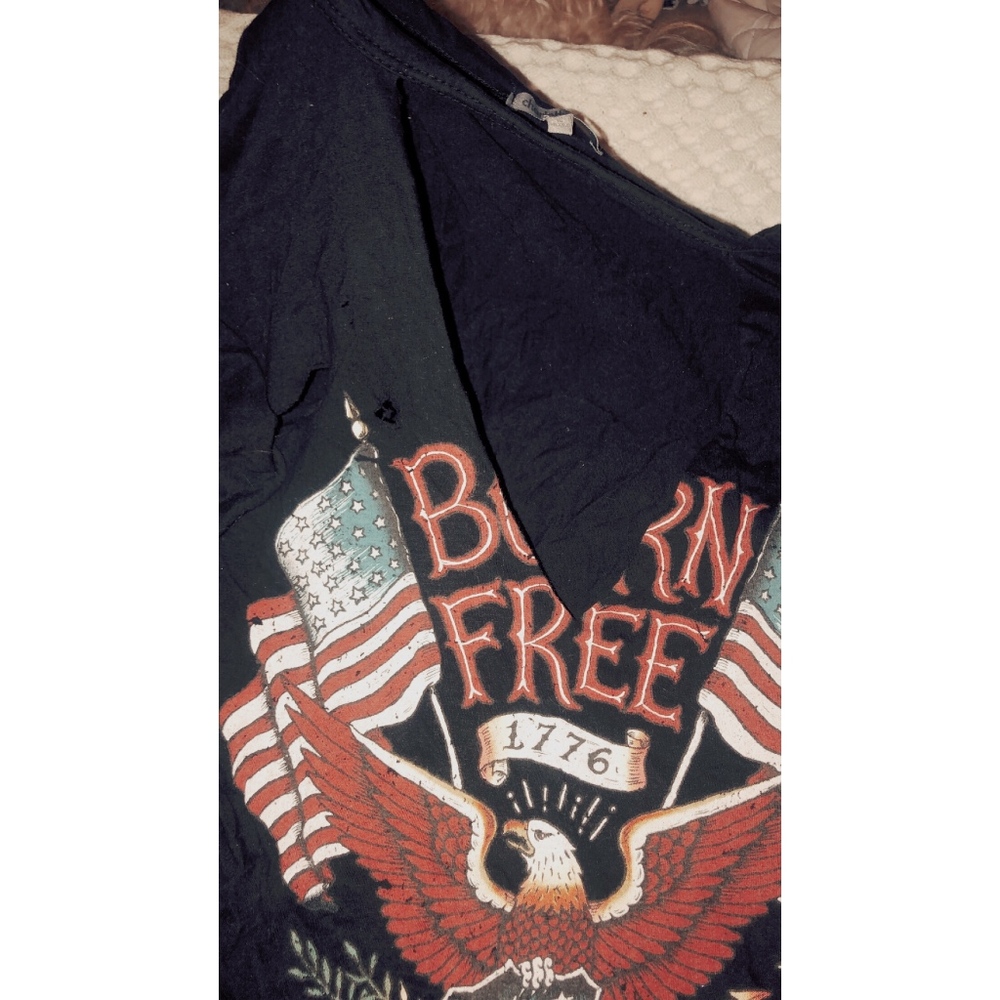 CHARLOTTE RUSSE cut out v-neck born free T-shirt